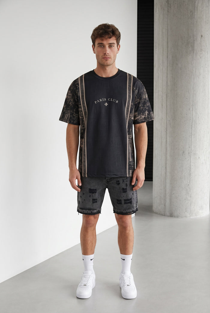Homme portant le maillot Club Paris noir en polyester et lycra avec imprimés graphiques par bonhomme